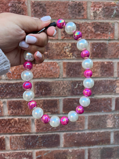 Collier de perles pour chien fuchsia